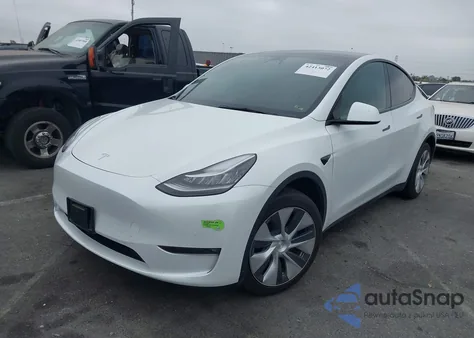 2023 Tesla Model Y Awd/Long Range Dual Motor All-Wheel Drive z USA, uszkodzony, nr VIN 7SAYGAEEXPF582955
